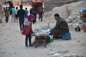 A little girl that took a moment for Her self, in between selling souvenirs to tourists